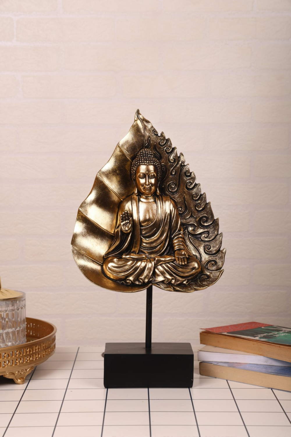 Buddha's Statue In Leaf On The Black Base for Your Home Or Office Decor