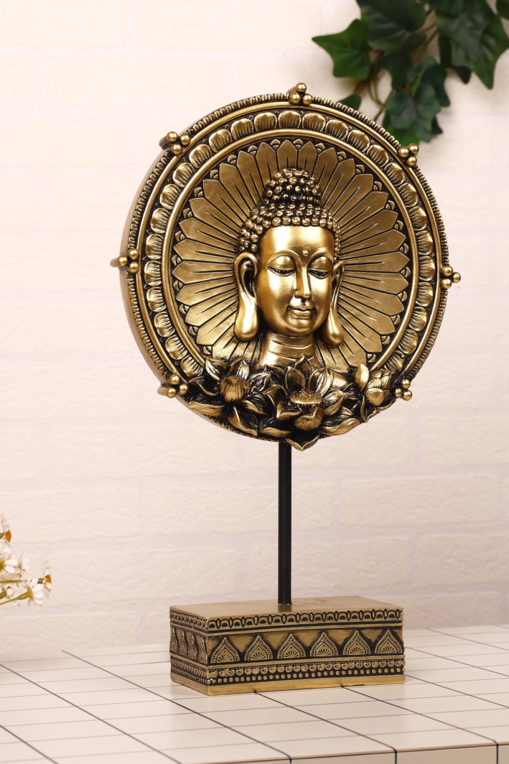 Round Shape Lord Buddha Face And Lotus Design Below The Face On a Golden Base Of a Stand for Your Home Or Office Decoration